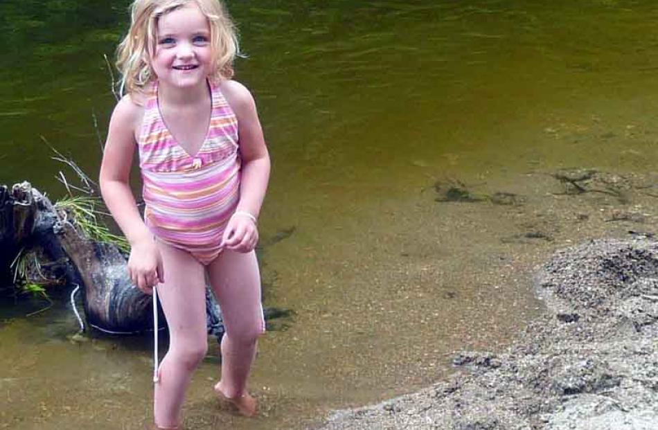 Lucy Robertson of Waikoikoi aged 4 braving the river at Piano Flat on the family camping trip at...