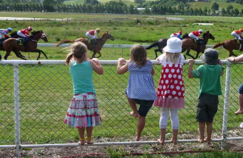 Enjoying the New Years Day Races at Waikouaiti. Photo: Lois Davis