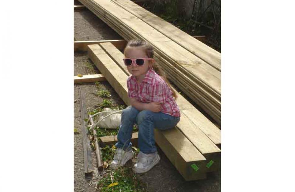 Child on board . . . Hope Stapley (3) showing what her Mum calls her "Dane Rumble sunglasses look...