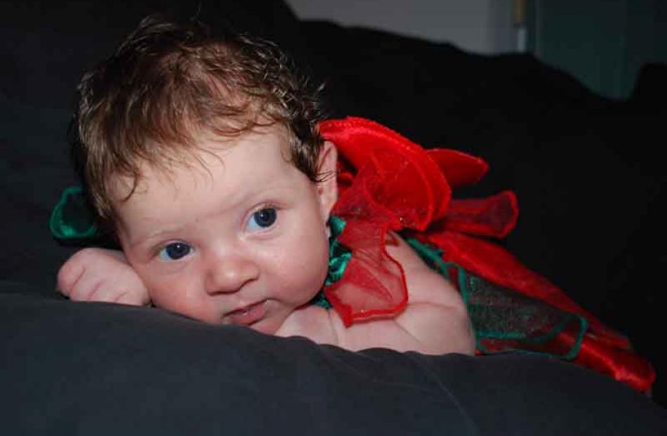 Chubby cherub... Photographer Liz Downeys magic moment was seeing her first grandchild, Kayla...