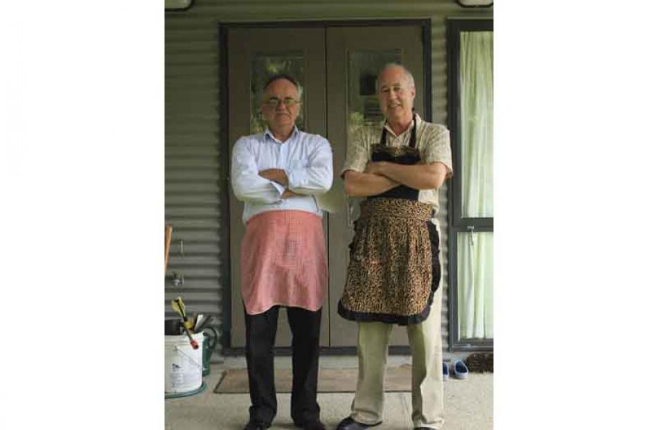 Pinnie Parade . . . brothers, John (left) and David Troon take a break during Christmas dinner...