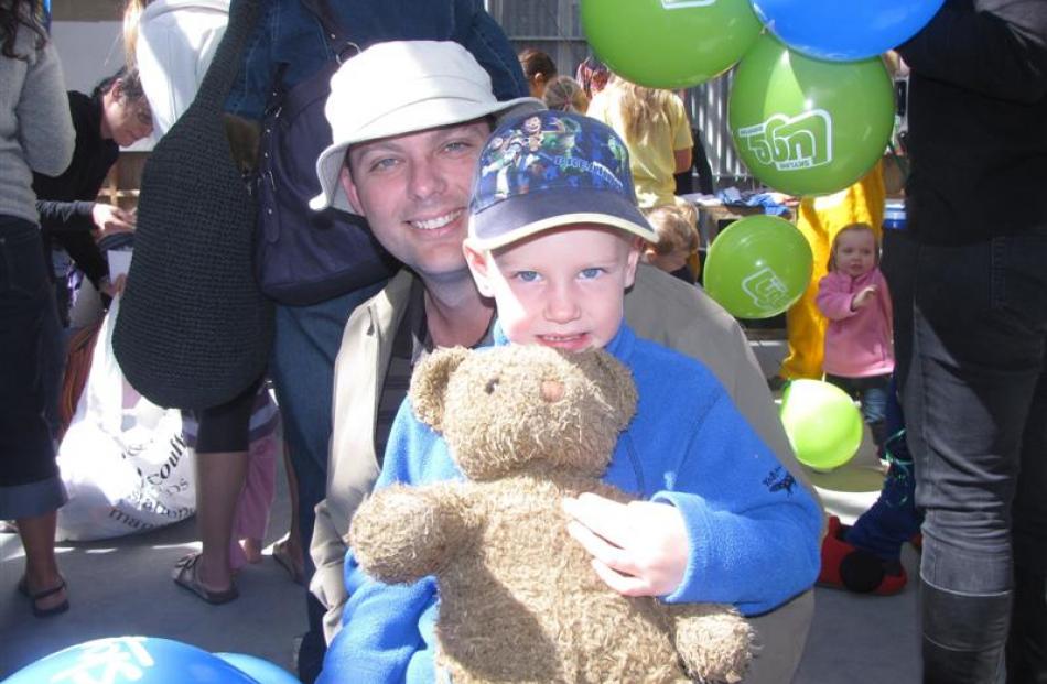 Aaron Jeffrey and son James (4), of Queenstown, with Big Bear.