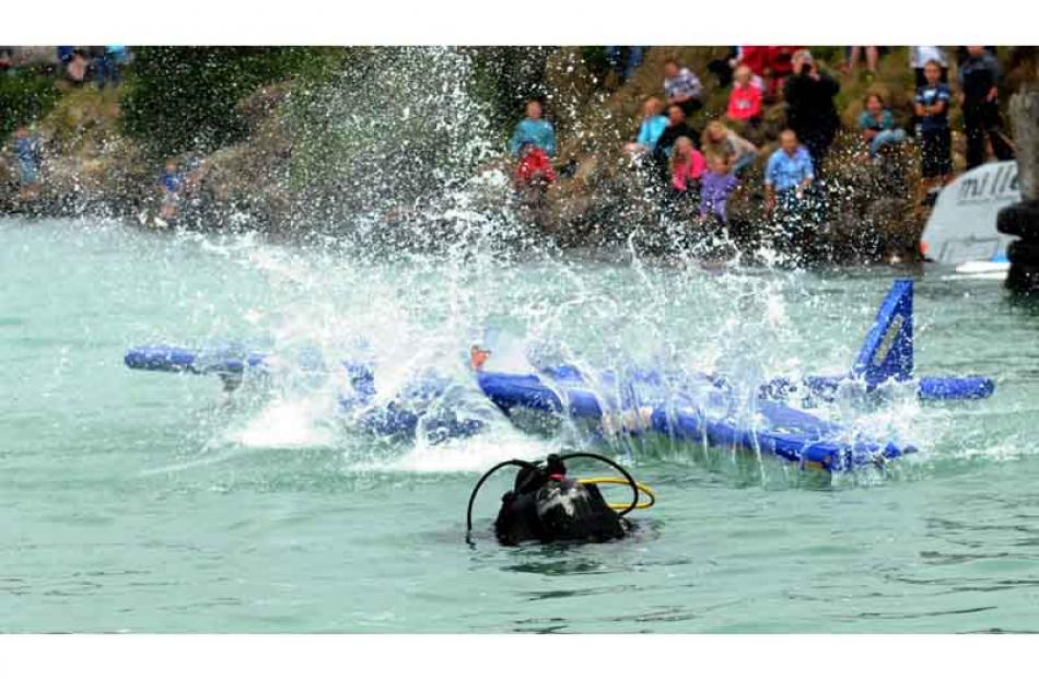 Cameron Hill's splashdown in the presence of a rescue diver.