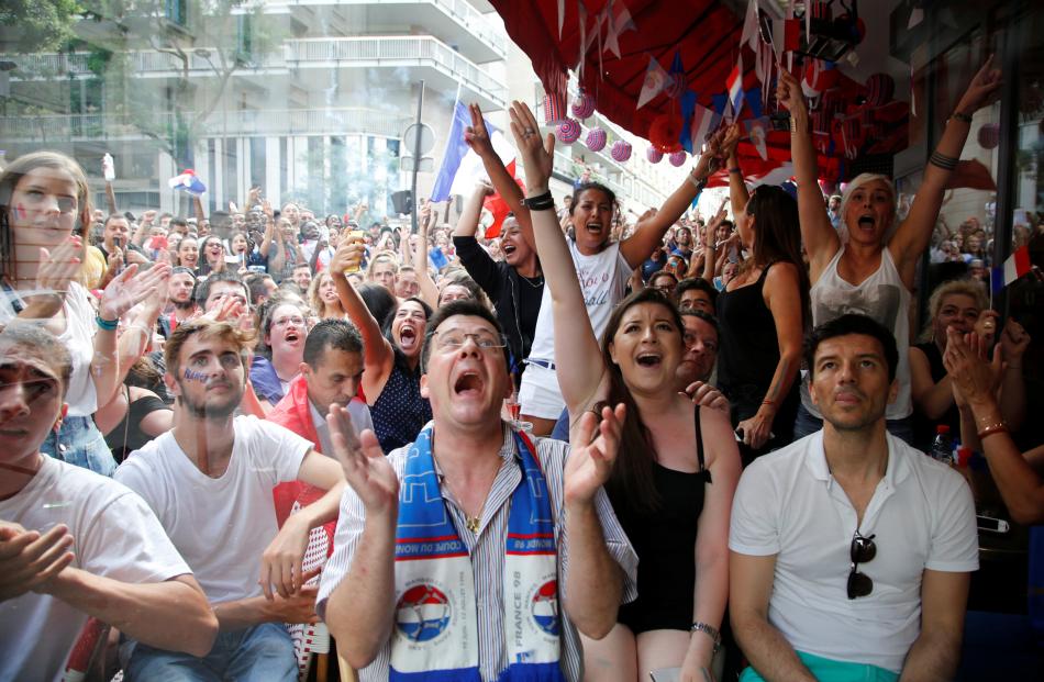  France fans watch France v Croatia in Paris. Photo: Reuters