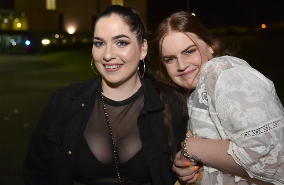 Georgia Binnie (19, left) and Jess Mackay (19), both from Christchurch, on their way to the...