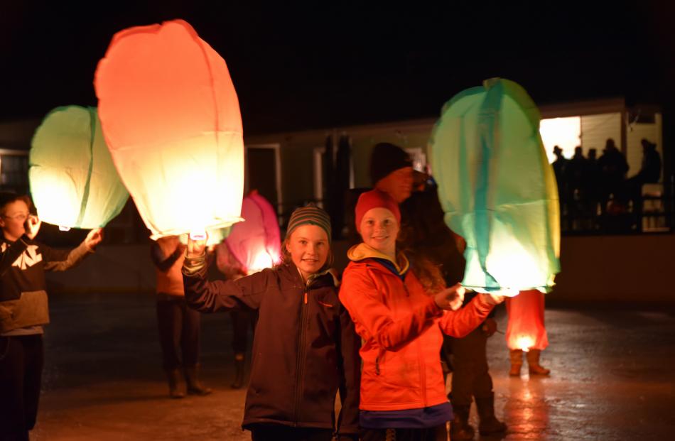 Cousins Briar Duncan (12, left), of Gimmerburn and Maggie Dowling (11), of Naseby,  get ready to...