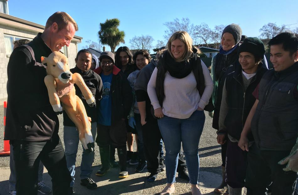 DairyNZ animal care extension specialist Tony Dench teaches calving best practice, using a life-sized rubber calf, at a CalvingSmart workshop in Hinds.