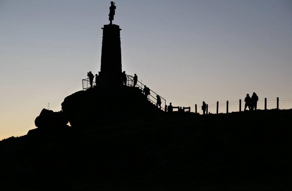 Many gathered at the Highcliff Memorial to see the moon. Photo: George Linington
