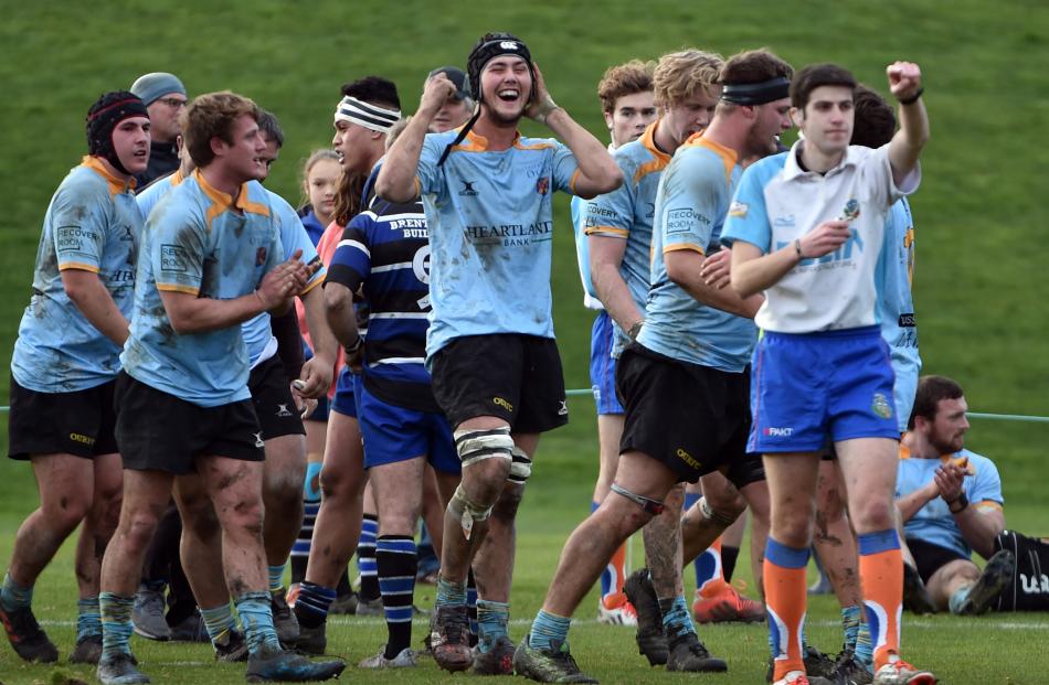 University A celebrate a try in their win over Kaikorai at University Oval. Photo: Peter McIntosh