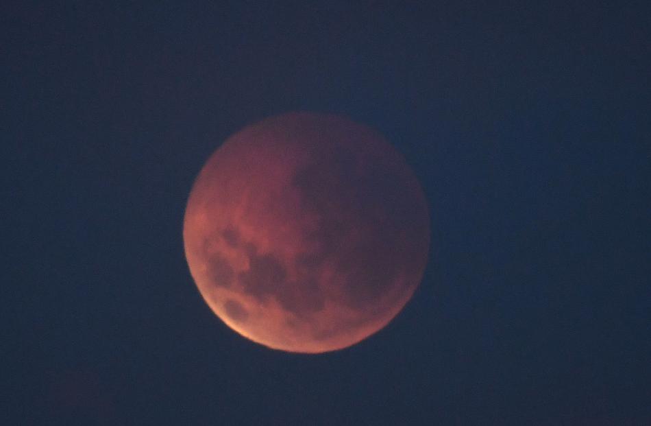 Before it disappeared behind the clouds, Southerners were treated to a rare lunar eclipse and...