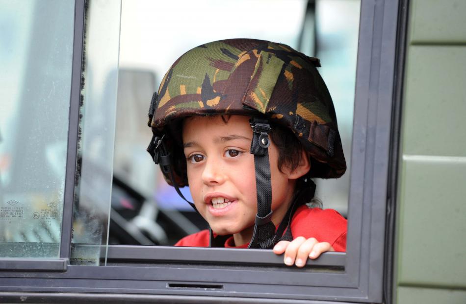 Tyrese McGregor has a sit in a light armoured vehicle stopping people from entering London St in...