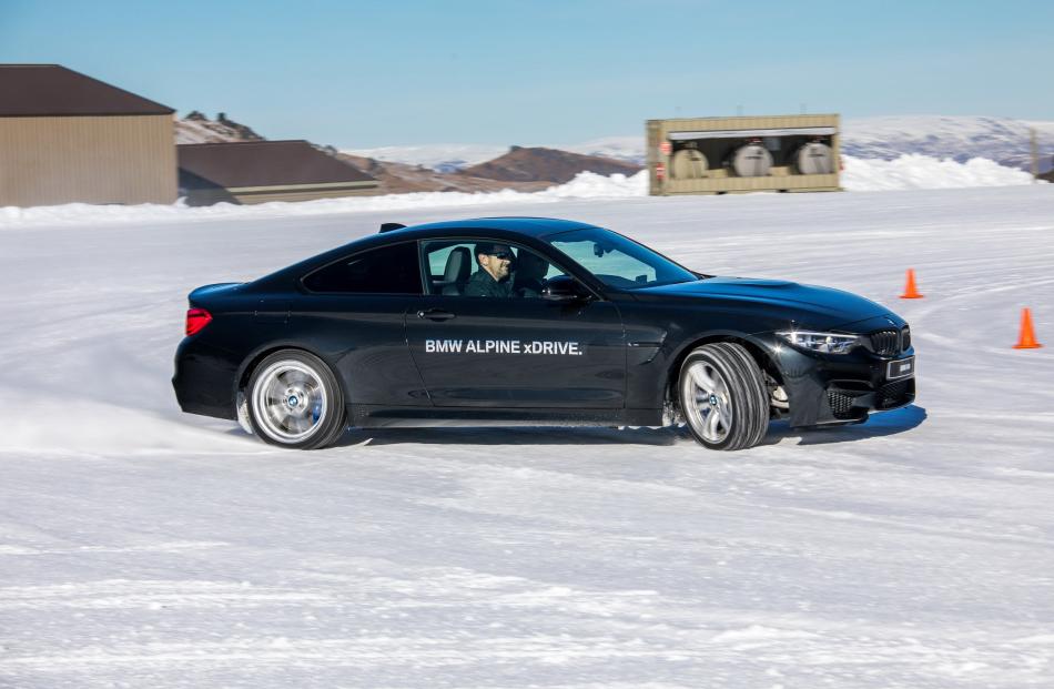 Author David Thomson drifting a BMW M4.