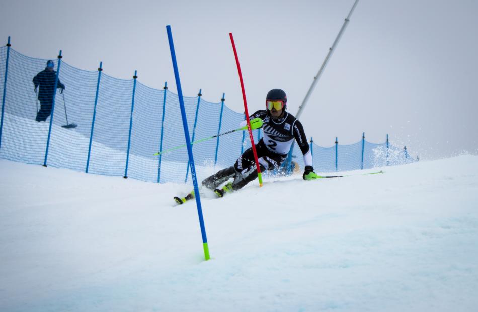 Adam Barwood on his way to winning the men's slalom title at the New Zealand Alpine championships at Coronet Peak yesterday. Photos: Stash MediaWork