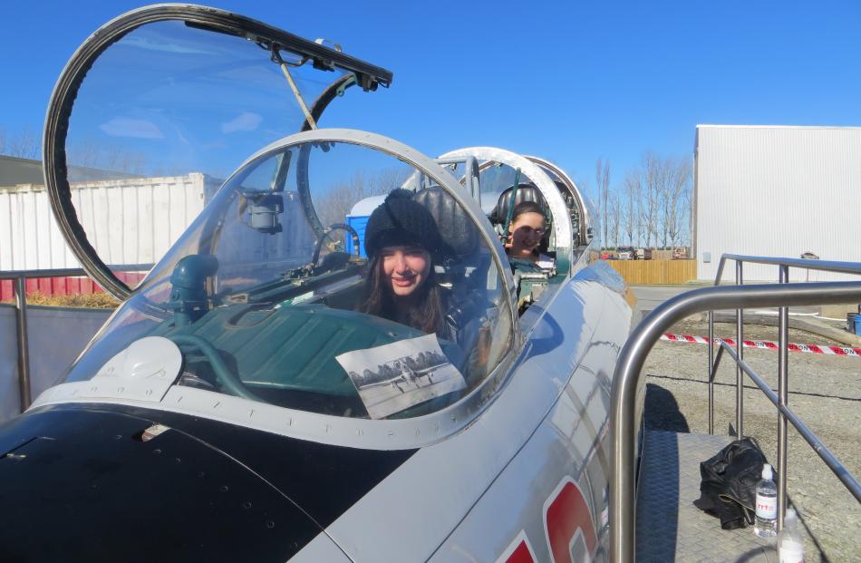 Bella Watson (15), of Mt Somers, and Lily Wilson (13), of Ashburton, try out the 1950s Russian L29 trainer jet on loan from the Ashburton Aviation Museum.