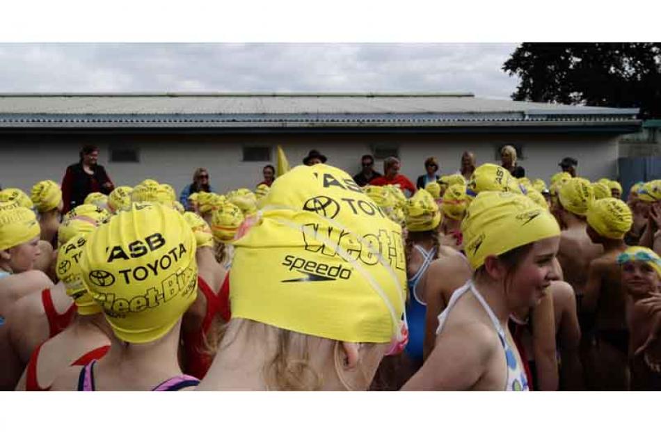 Getting ready for their first leg are Weet-Bix Tryathlon participants, in Mosgiel yesterday.