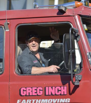 Special Rigs for Special Kids founder Greg Inch leads the convoy through Dunedin yesterday. 
