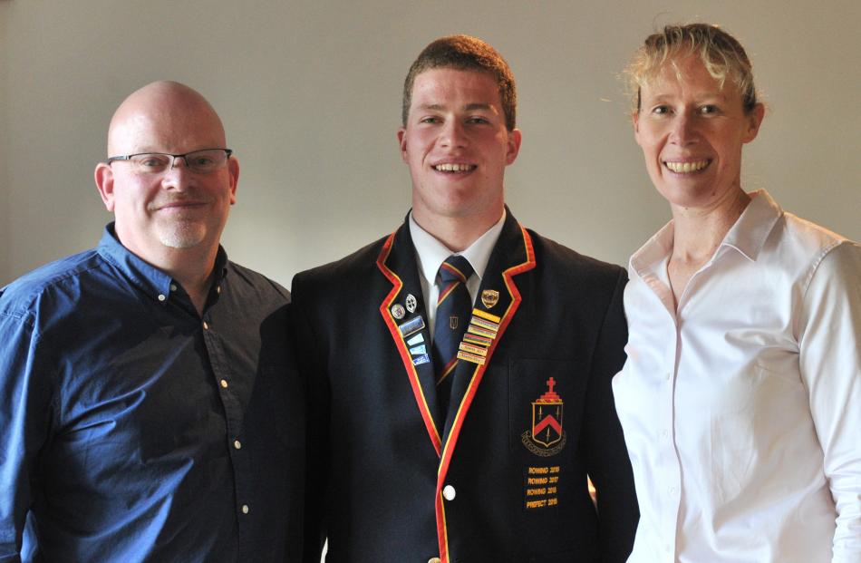 John McGlashan College pupil Jack McLaughlan and his proud parents Paul and Jo, all of Dunedin....