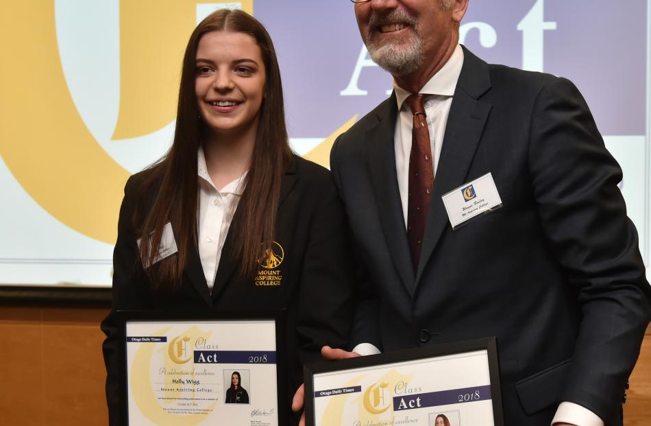 Mount Aspiring College pupil Holly Wigg (17) and principal Wayne Bosley, accepting on behalf of...
