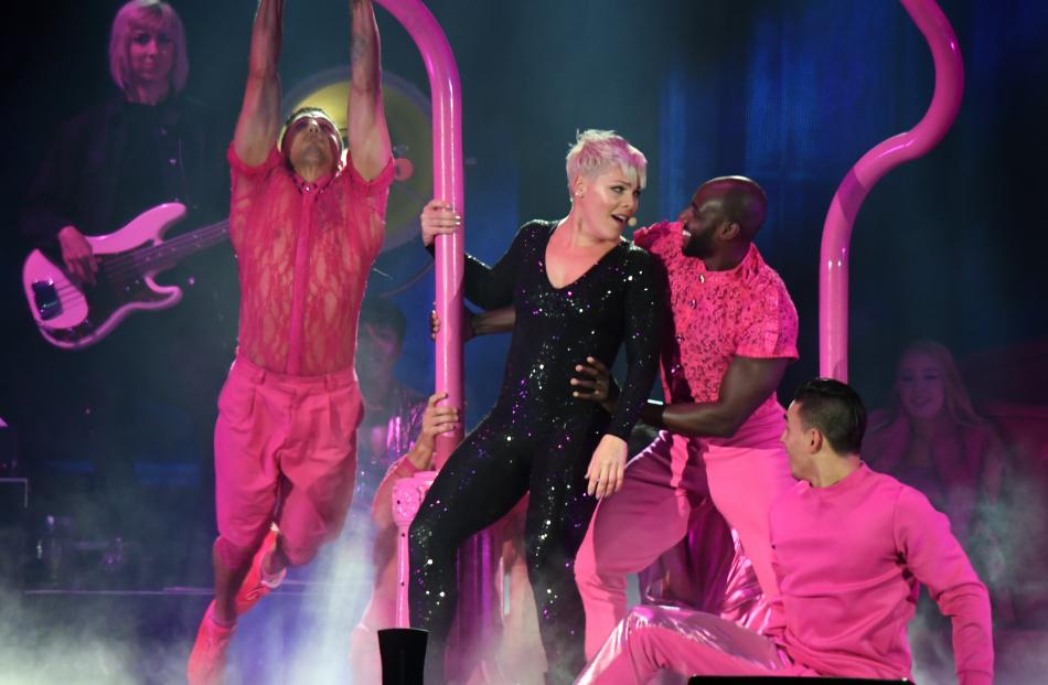 Pink performs with her dancers. Photo: Stephen Jaquiery