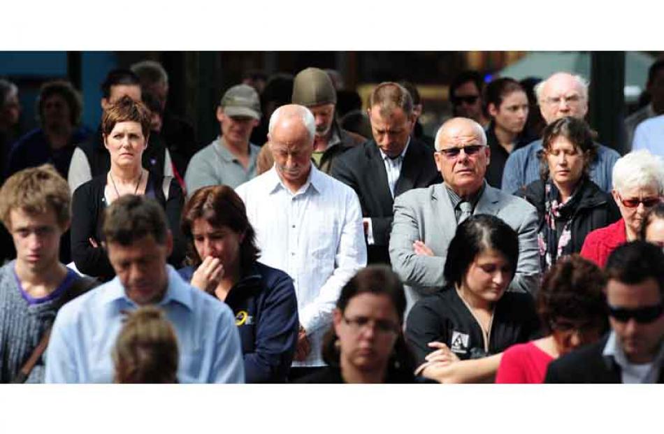 Two minutes silence observed in the Octagon for the victims of the Christchurch earthquake. Photo...