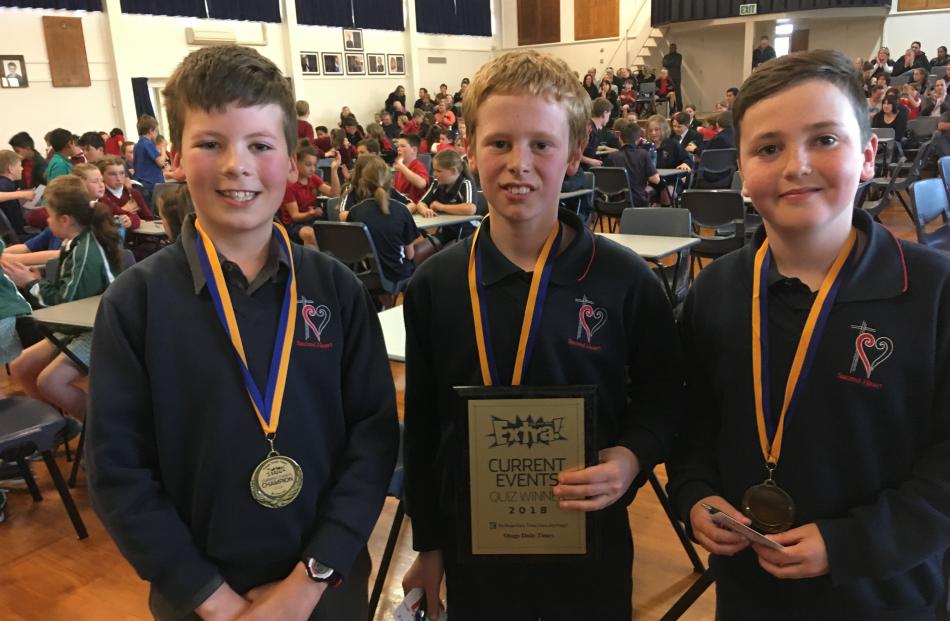Sacred Heart Timaru pupils (from left) Jed Fenwick, David van der Spuy and Christian McCambridge (all 10) took first place in the Otago Daily Times Extra! Central South Island Year 5-6 Quiz at Timaru Girls' High School last night. Photo: Chris Tobin
