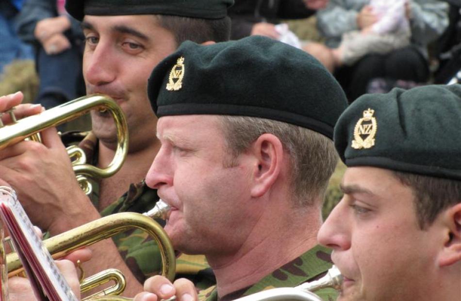 New Zealand Army Band musicians (from left) Sergeant Tyme Marsters, Private Kevin Hickman and...