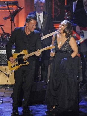 Darlene Love perfroms backed by Bruce Springsteen.