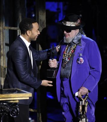Dr John, right, accepts his award from John Legend.