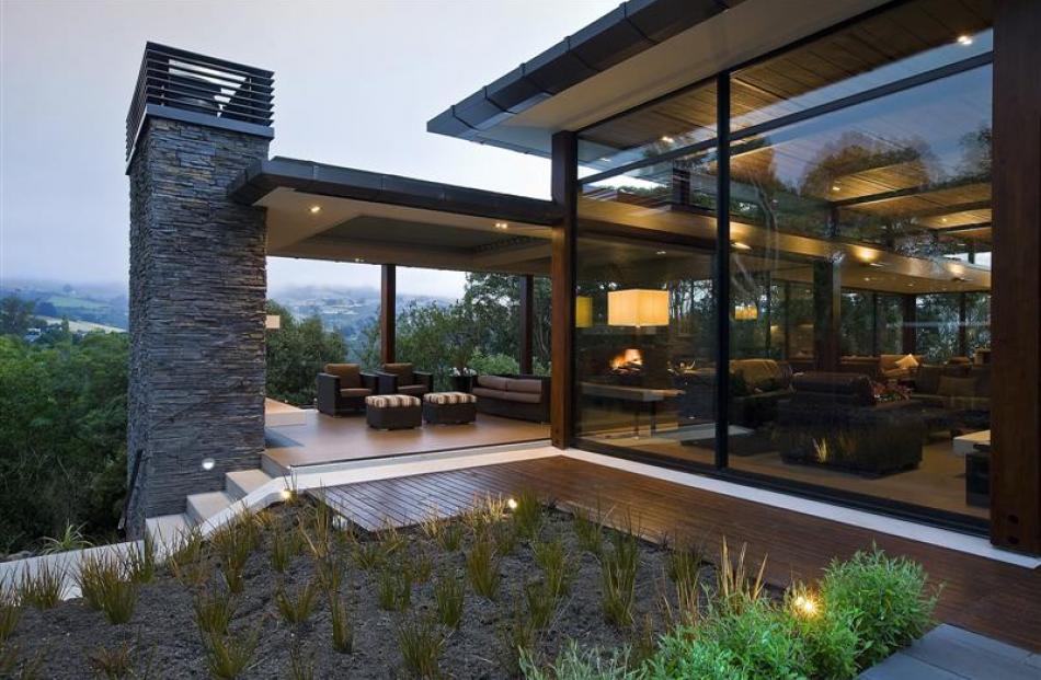 The central living space opens on to an outdoor terrace.