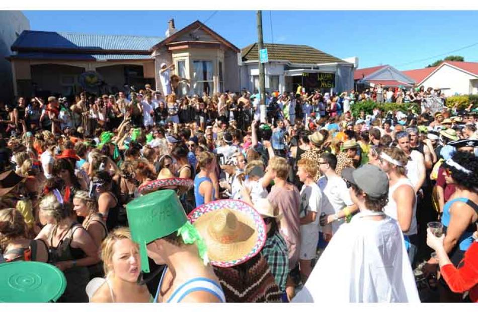 The good-natured crowd continues partying. Photo by Peter McIntosh.