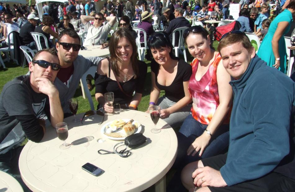 From left, Ross Woodvine, Gabriel Martinez, Hanna Downey, Trudy Clay, and Angela and Chris James,...