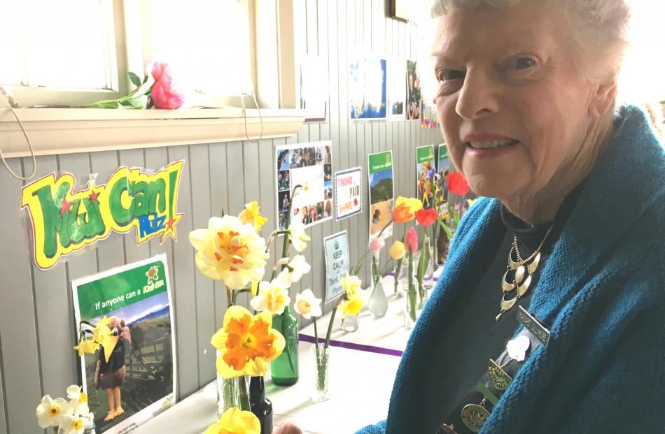 Wakanui WI member Margaret Cullimore with her three different daffodils entry for competition. She also competed in knitting and baking sections.