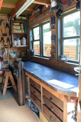 An old work bench from a preschool where Ms Diettrich taught, has drawers made from apple boxes...