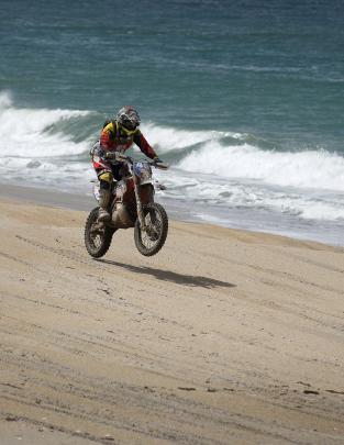 The unique expereince of riding enmasse down Chrystalls Beach was fun for many of the 900 off road motorcycle riders on the16th annual Lakes to Sea trail ride for off road bikes and atvs at Milton on Saturday start to long ride home to Milburn. Photo: Joh
