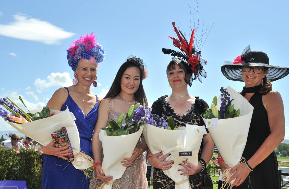Fashions in the Fields winners Jennie Hasler-Jacobs, of Balclutha (left, best fascinator), Nam Nguyen, of Mosgiel (second place), Lisa Lamb, of Chain Hill (first place) and Louise Dale, of Stirling (third). 