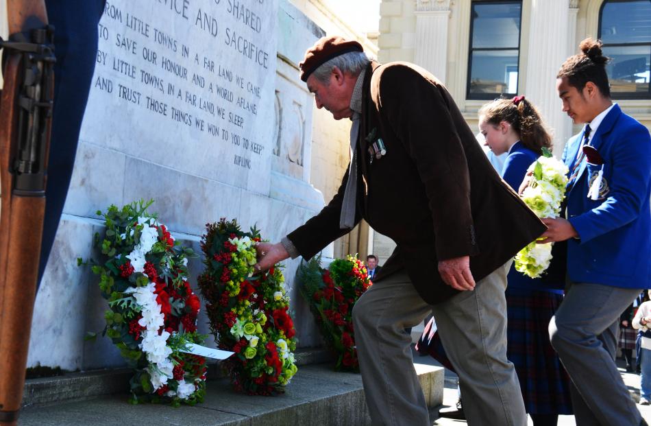 Waitaki district councillor Guy Percival, who served in the former Rhodesia, lays a wreath at...