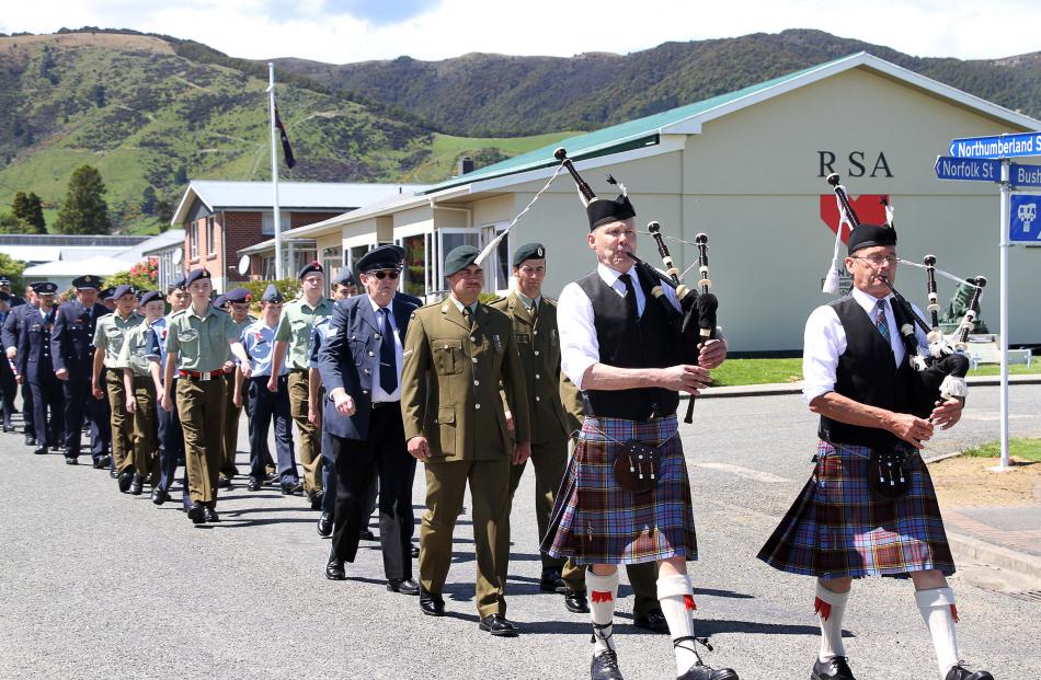 Servicemen and women march through the centre of Tapanui to commemorate the end of World War 1...