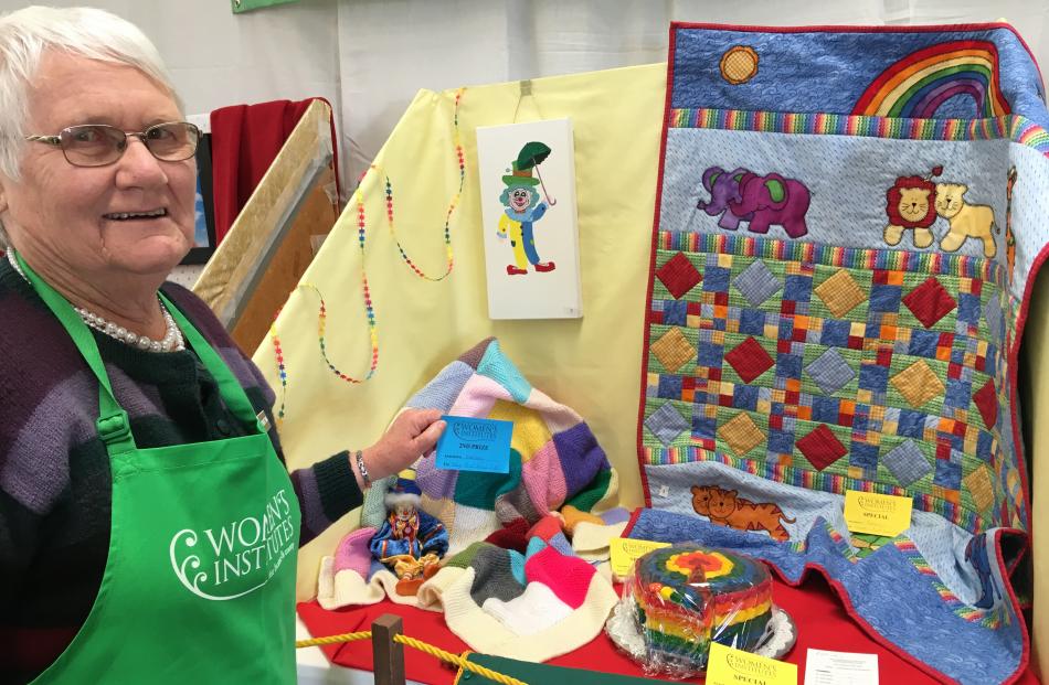 Netherby WI secretary Catherine Thomas shows the Netherby WI bay entry in the Home Industries Pavilion.