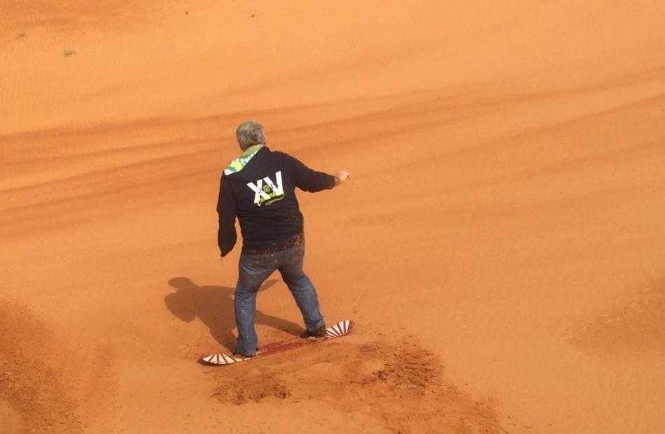 Peter Heron Sand boarding on the dunes. Photo: Deborah Heron