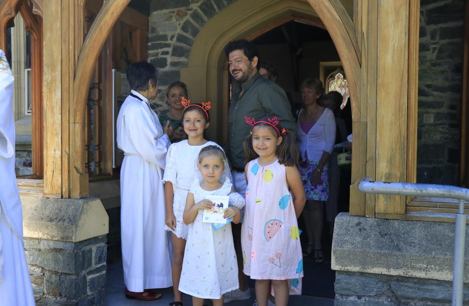 Little'uns (from left) Kitty (9), Mariam (5) and Mani Zaki (8) at St Peter's Anglican church,...