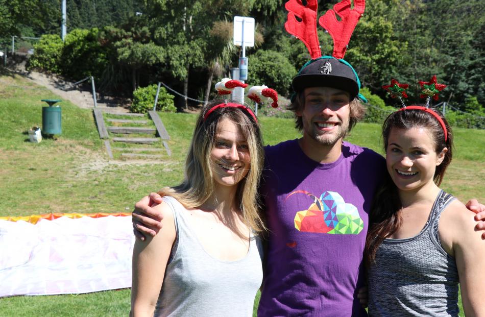 Paragliders (from left) Angelique Vinnedge, Billy Waller and Sophie Rolleston-Smith pack up after...
