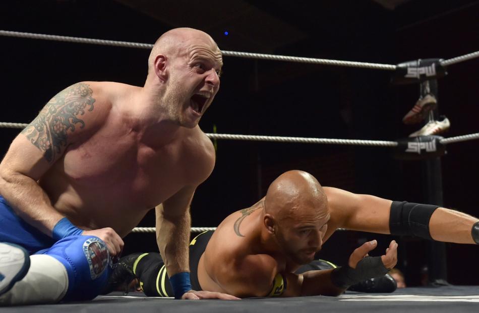 The crowd gets involvedwith shouting and encouragement for Marc Perry, of England (left), and Kane Bates, of Invercargill, during alive pro wrestling event at the University UnionHall in April. Photo: Peter McIntosh The crowd gets involvedwith shouting and encouragement for Marc Perry, of England (left), and Kane Bates, of Invercargill, during alive pro wrestling event at the University UnionHall in April. Photo: Peter McIntosh