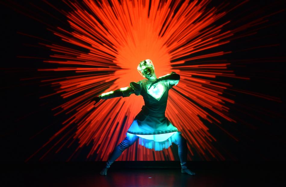 A spectacular light show silhouettes dancer Katalin Lengyel in Ann-Droid, a retelling of the Pinocchio story at Mayfair Theatre as part of Arts Festival Dunedin in September. Photo: Peter McIntosh