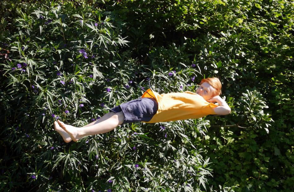 Kaya Howes in pose mode while trampolining on Christmas Day in the back yard in Ravensbourne....