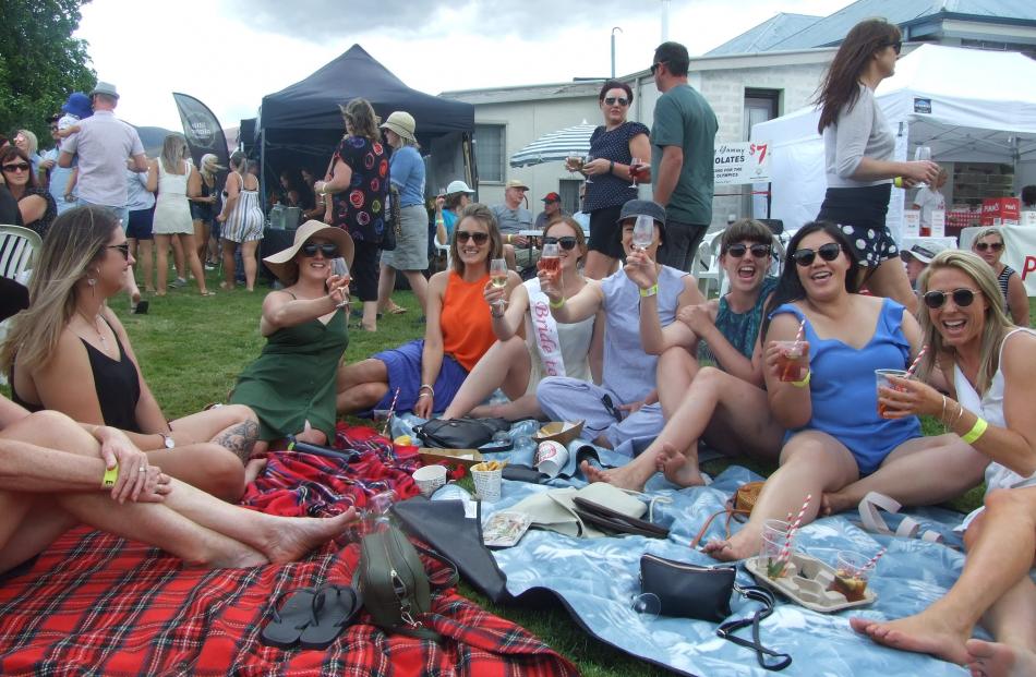 A hens' party enjoys the festival atmosphere.