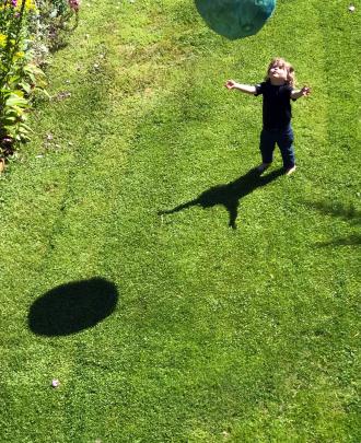 Emile Sinclair (2) plays with a ball in his grandparents’ garden. Photo: Jacqueline Sinclair