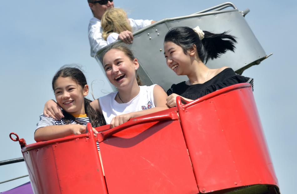 Enjoying a ride are (from left) Jemma West  (13), Ellen Mamier (15) and Ploy Promyot(13), all of...