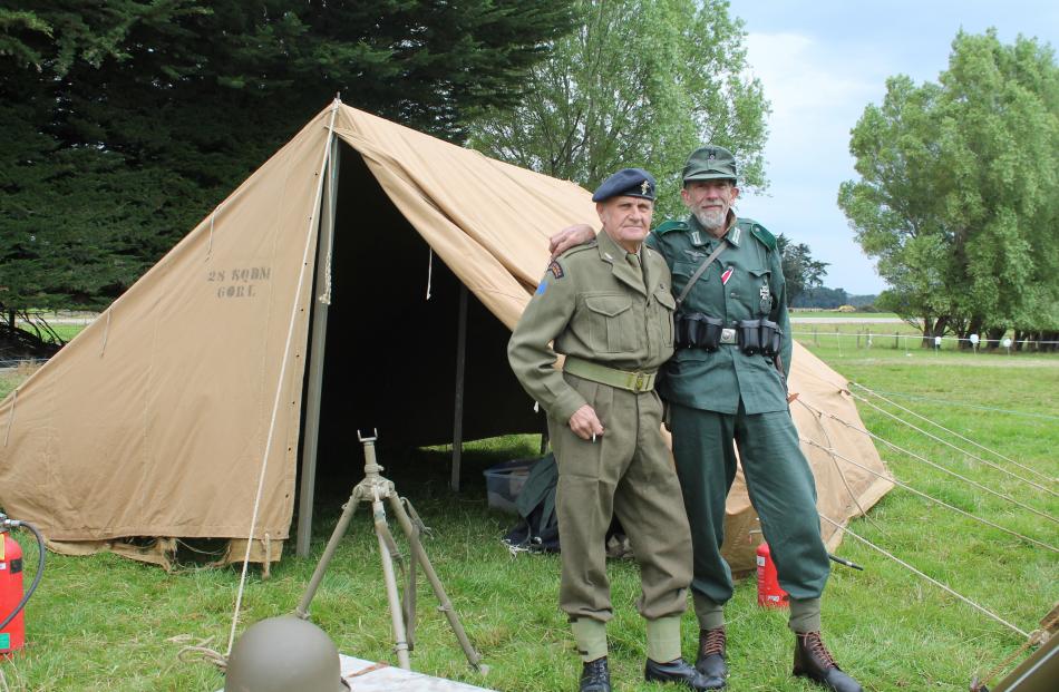 Bill Riddell and Martin Larkin wearing original military clothes from New Zealand and Germany.