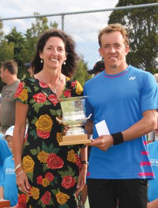 Julie Paterson of Auckland (ex Te Anau) CEO Tennis New Zealand presenting the Willans Trophy to...