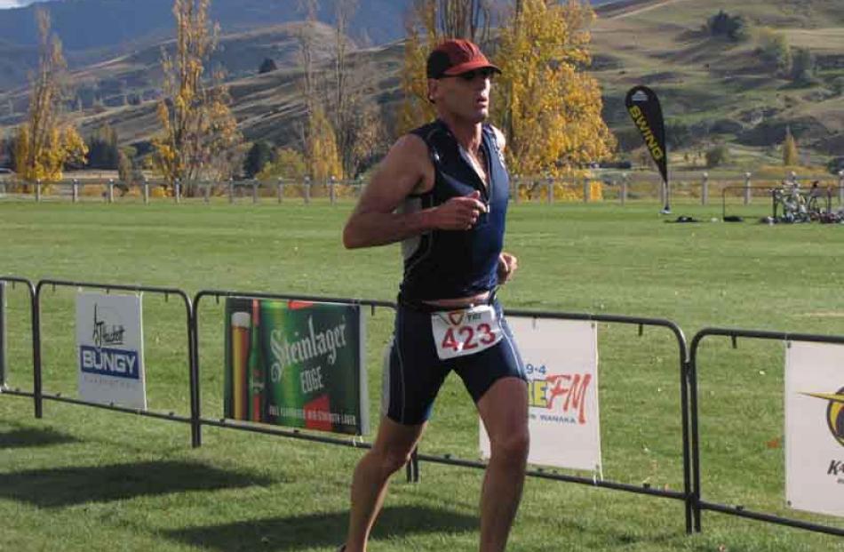 Mark Cockroft, of Wanaka, about to finish second in the Triathlon Swim Veteran Male category.